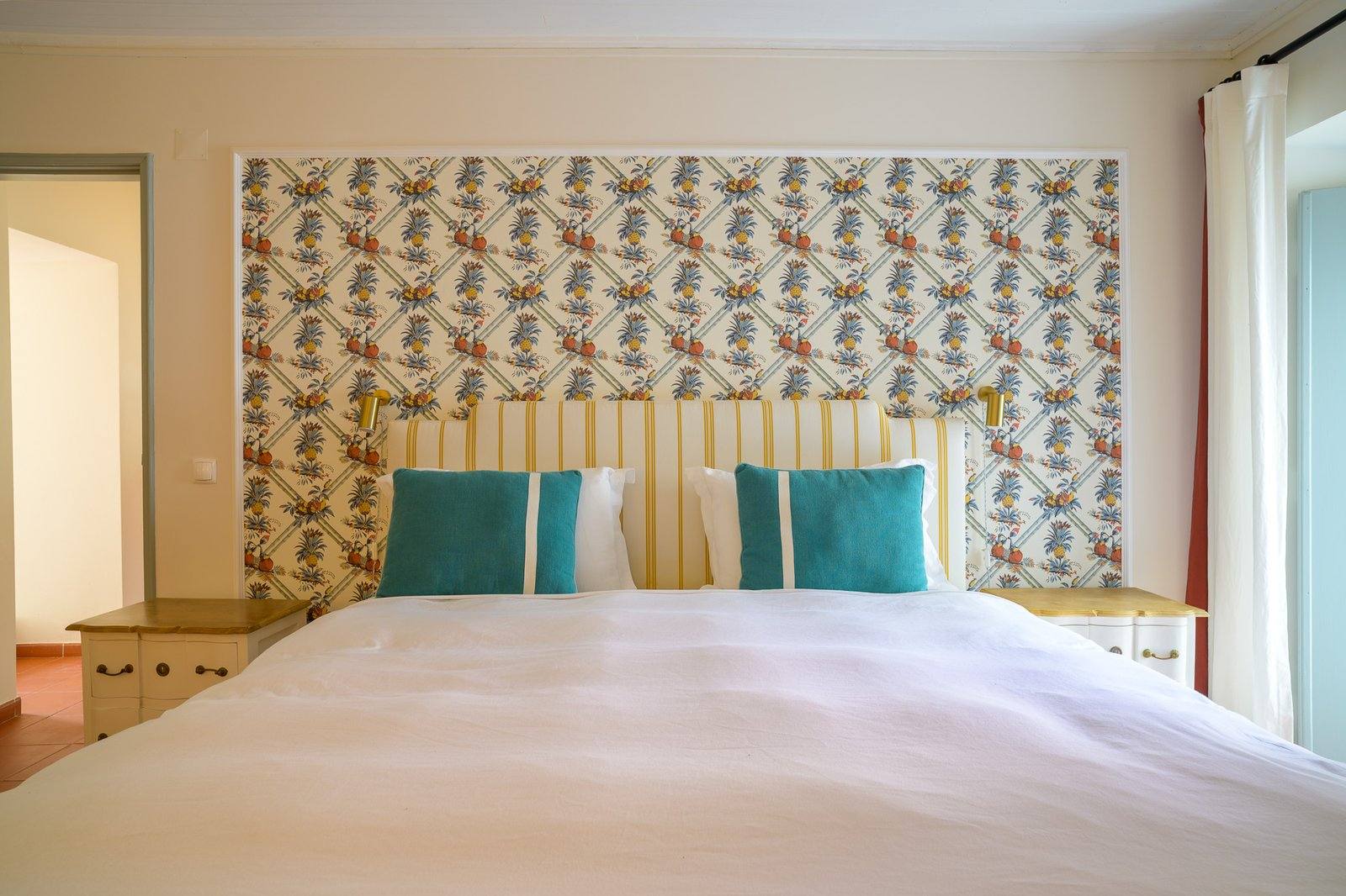Bedroom with floral wallpaper