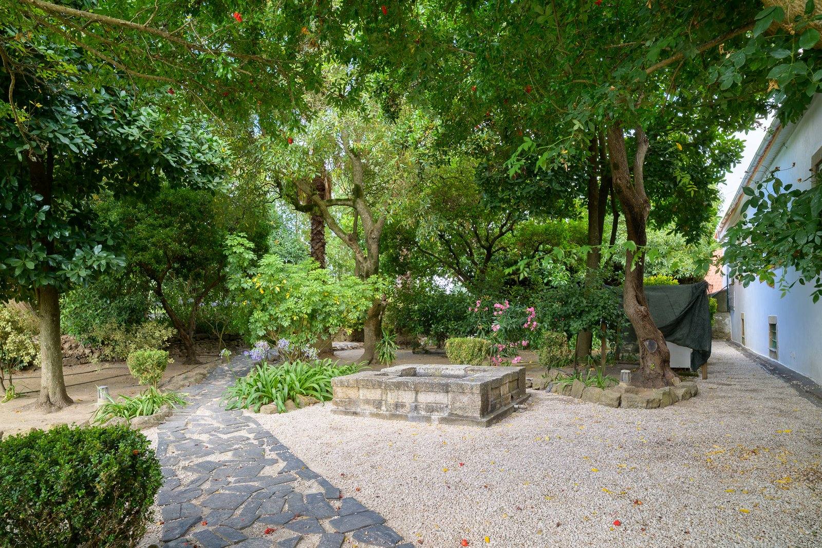 Stone fountain in the pebble garden